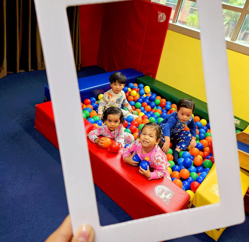 Child exploring, learning, and building confidence through fun and engaging activities at My Gym Singapore