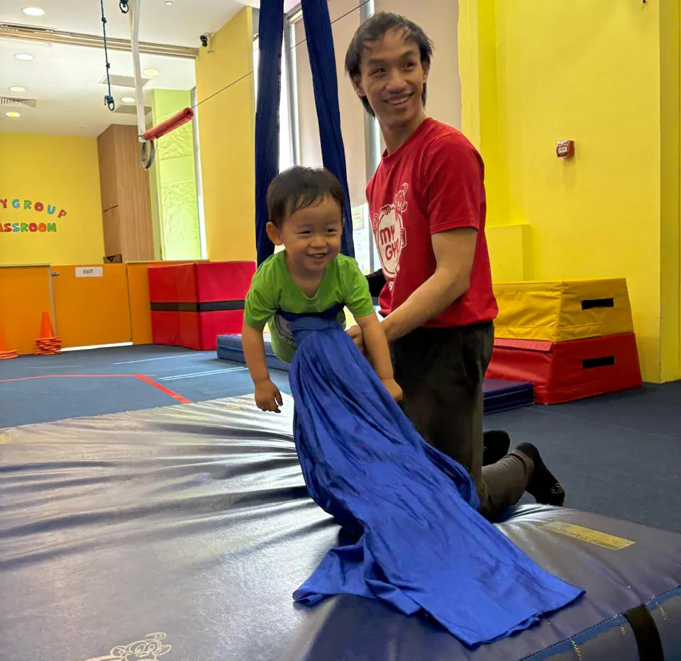 Child gaining emotional strength through play at My Gym
