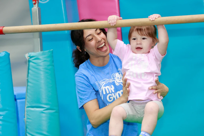 Coach-led play that builds confidence.